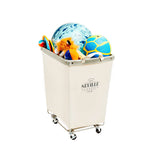 Corner Heavy-Duty Canvas Hamper w/Wheels, 24"W x 17.7"D, Natural White | Space-saving corner design holds 3 to 4 loads of laundry with a durable steel frame, smooth-rolling locking wheels