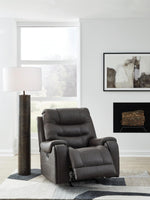 Signature Design by Ashley Skymaker Modern Faux Leather Manual Rocker Recliner with Track Arms, Dark Brown