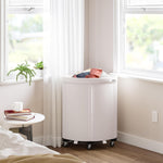 Corner Heavy-Duty Canvas Hamper w/Wheels, 24"W x 17.7"D, Natural White | Space-saving corner design holds 3 to 4 loads of laundry with a durable steel frame, smooth-rolling locking wheels