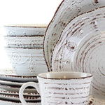 Elama Rustic Birch 16 Piece Embossed Scalloped Stoneware Round Dinnerware Set in White with Brown Accents