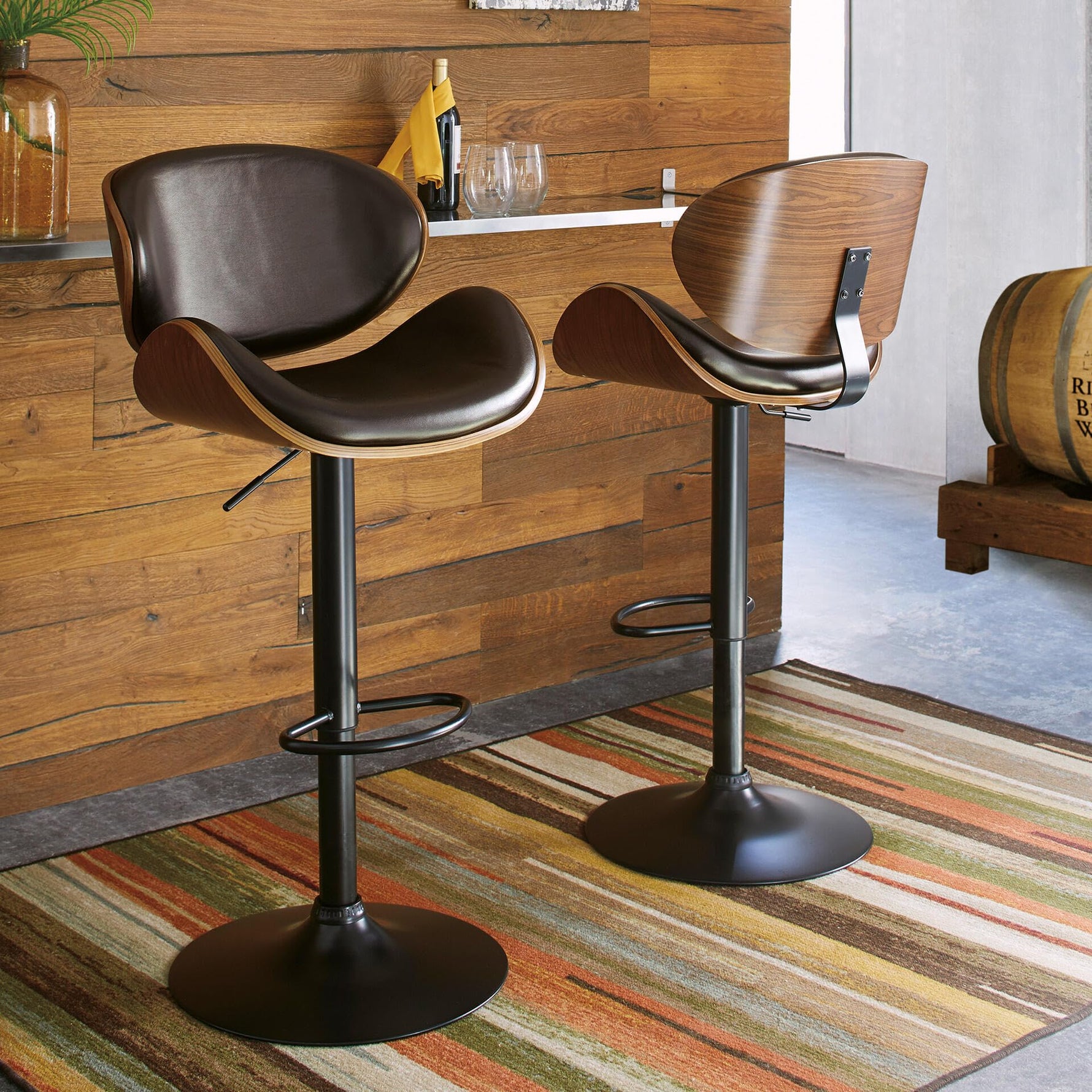 Signature Design by Ashley Centiar 24" Counter Height Modern Bucket Barstool, 2 Count, Black